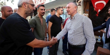 baskan-buyukakin-karamurselde-esnafla-bulustu.jpg
