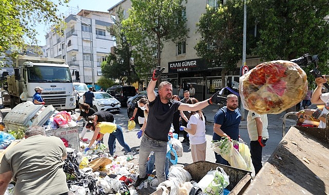 baskan-gorkem-duman-vatandaslarla-cop-topladi.jpg