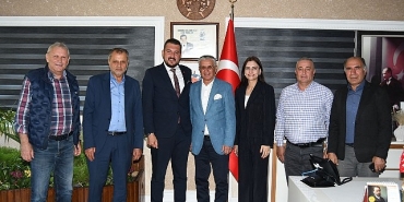 korkuteli-belediye-baskanindan-baskan-topalogluna-ziyaret.jpg