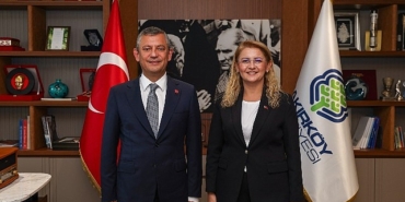 ozgur-ozelden-baskan-ovaliogluna-hizmet-ovgusu.jpg