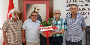 temad-burhaniye-sube-baskani-murat-duzkoy-baskan-devecileri-makaminda-ziyaret-etti.jpg