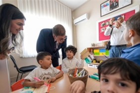 yuvamiz-izmirde-veliler-de-cocuklar-da-mutlu.jpg